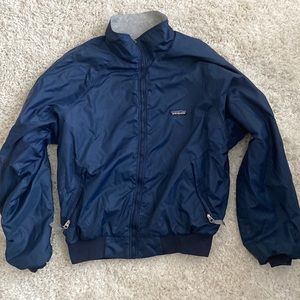 Men’s vintage Patagonia bomber jacket navy blue size medium.